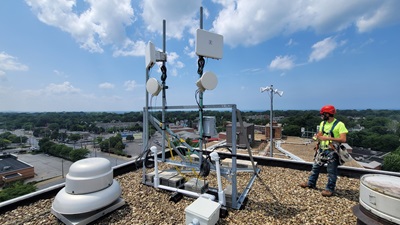 Digital C worker on rooftop