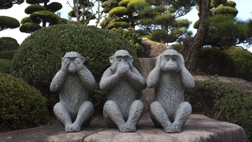 A statue of three monkeys: see, speak or hear no evil