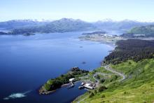 Aerial view from Pillar Mountain of Kodiak Alaska harbor surrounded by moutains