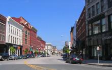 Downtown Rutland VT two story buildings line each side of street